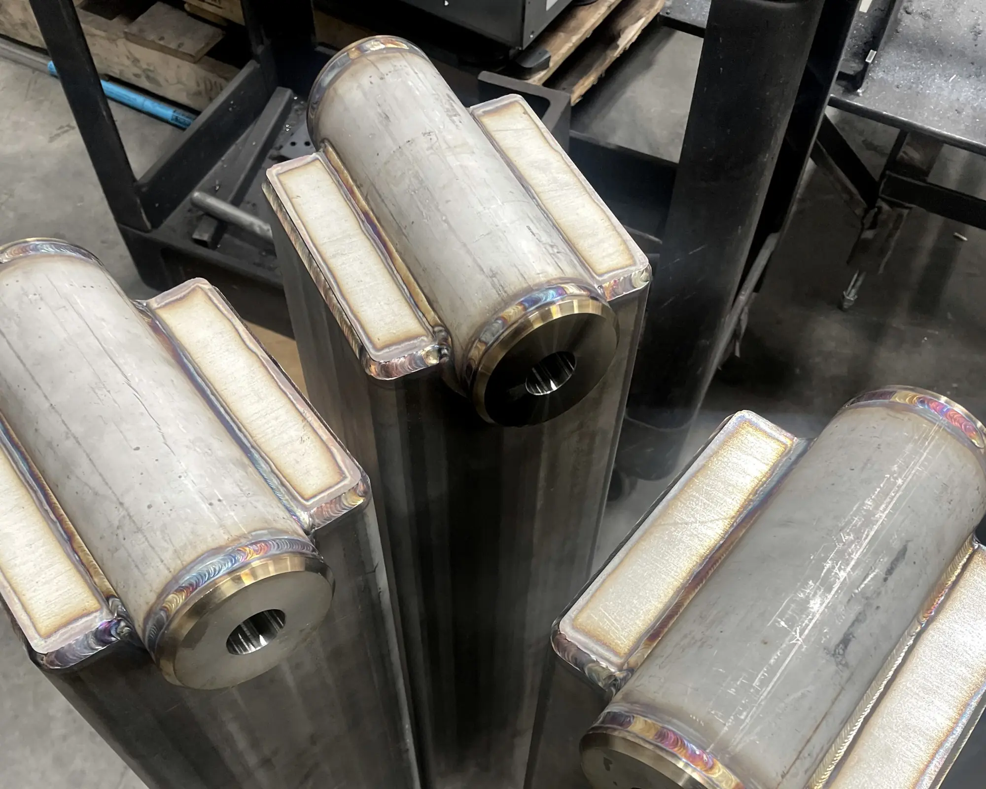 TIG welded end caps with heat tint