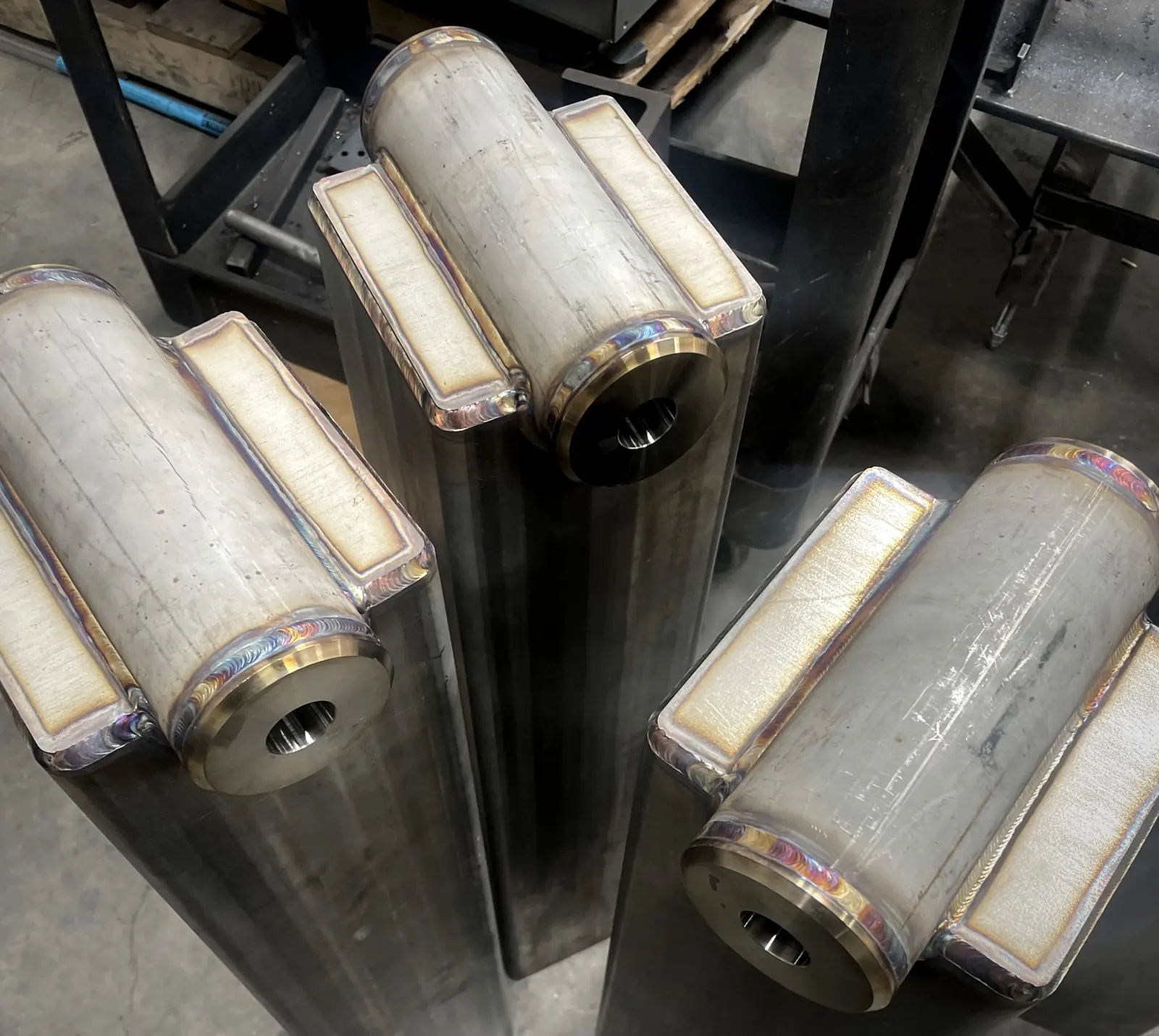 TIG welded end caps with heat tint